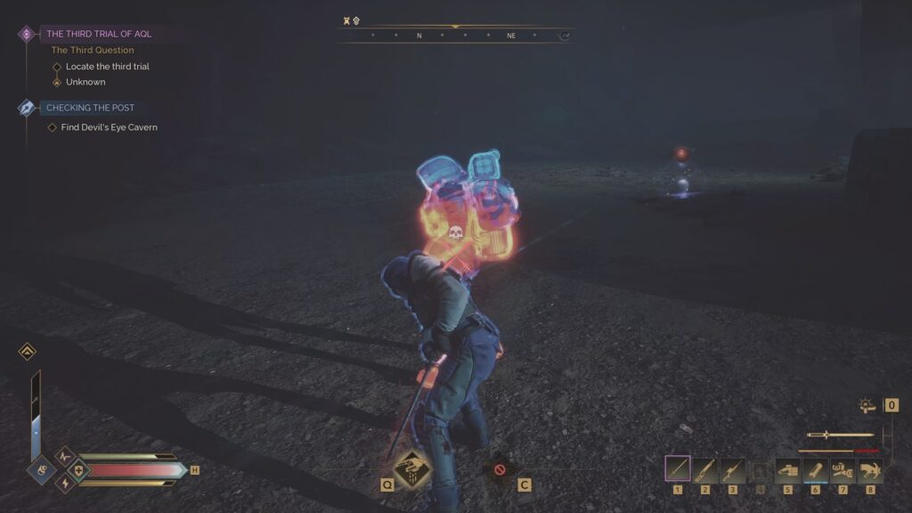 Player character crouches in a dark cavern environment in Dune: Awakening, highlighted by a red and blue glow around a marked enemy or object with a skull icon. Active quests on the left include “The Third Trial of Aql” and “Checking the Post,” while the HUD shows weapons, health, and ability icons.
