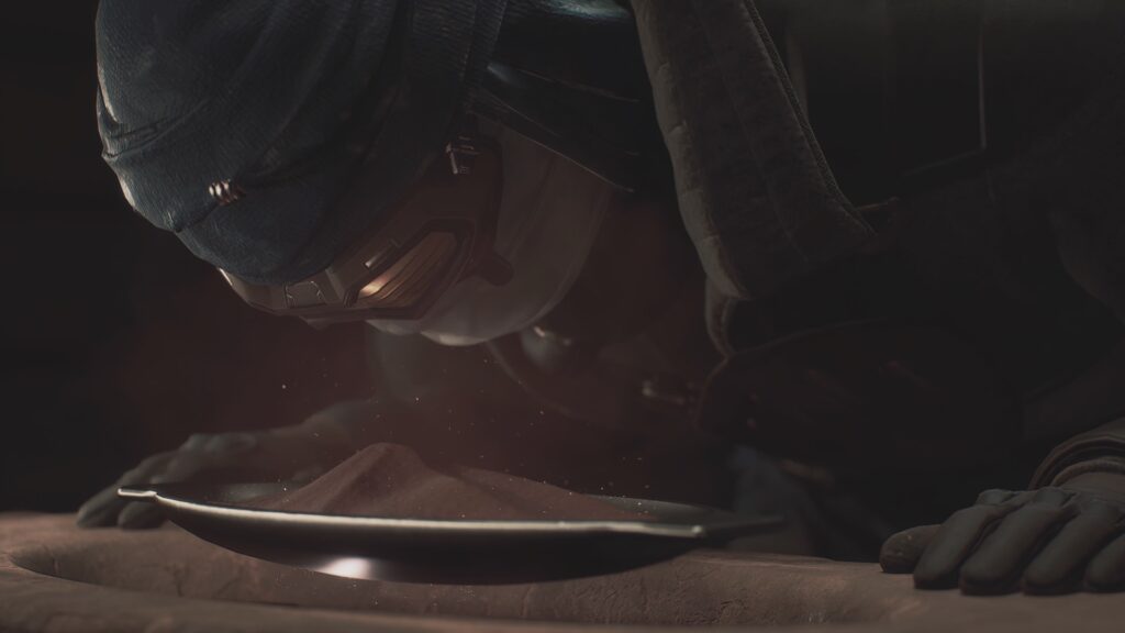 Close-up of a character in Dune: Awakening wearing a stillsuit and goggles, leaning in to closely examine or inhale spice dust from a shallow metal dish, with particles suspended in the air for a dramatic effect.